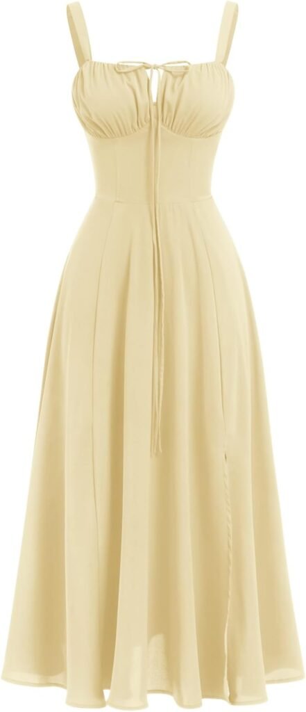 Robe midi jaune pâle à bretelles et lien noué sur le décolleté.
