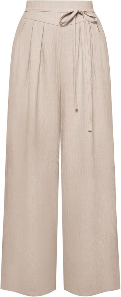 Pantalon fluide beige clair à taille haute nouée.