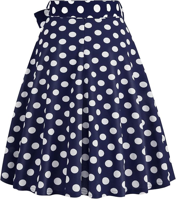 Jupe vintage à pois bleu marine avec nœud à la taille.