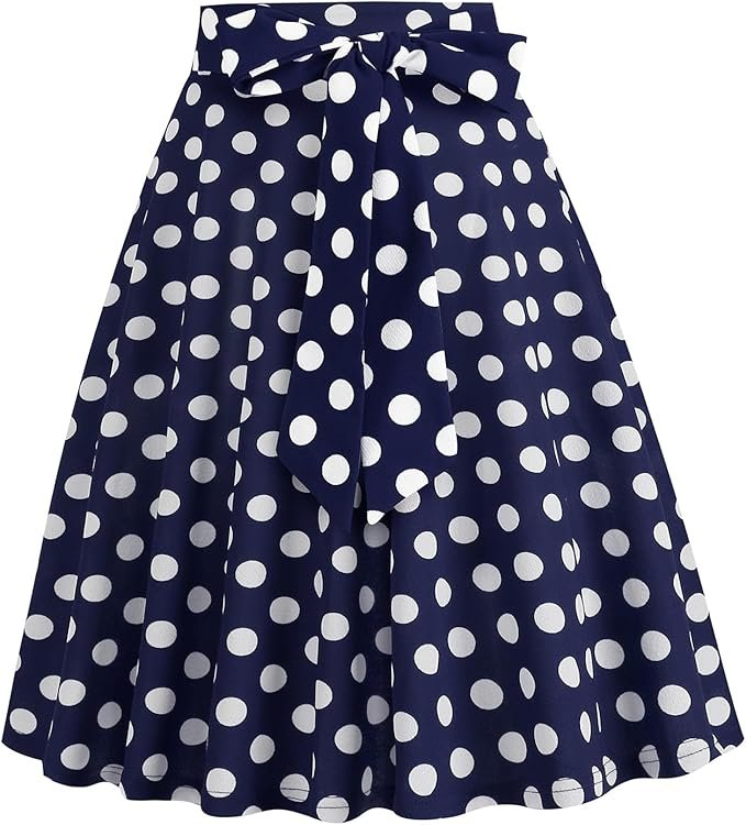 Jupe vintage à pois bleu marine avec nœud à la taille.