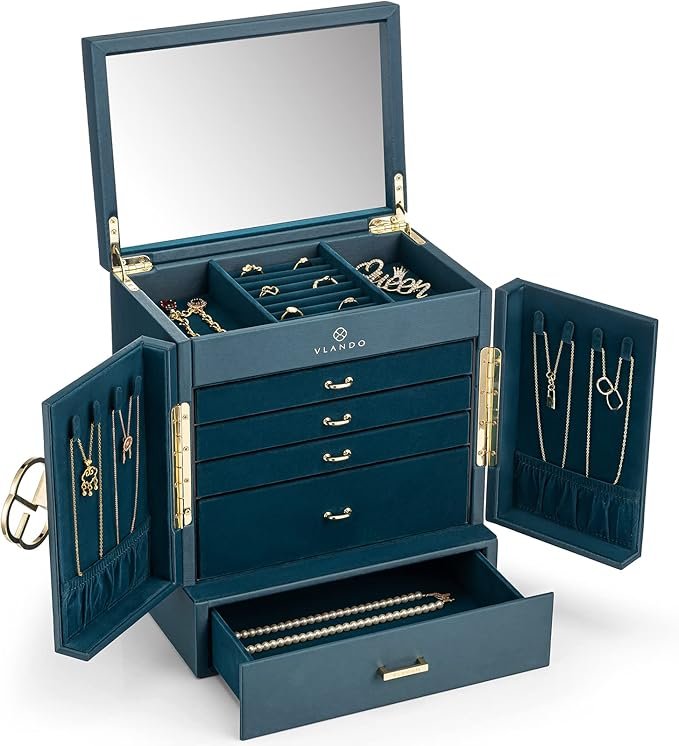 Boîte à bijoux Vlando bleu foncé avec miroir, tiroirs et rangements multiples.