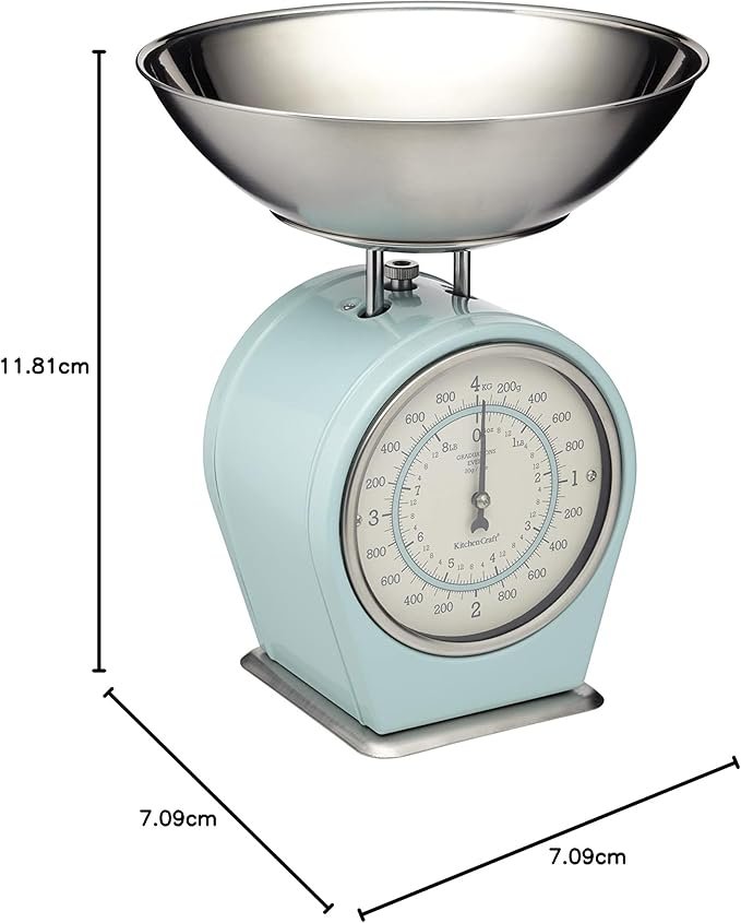 Balance de cuisine vintage bleu pastel avec bol inox et cadran analogique.