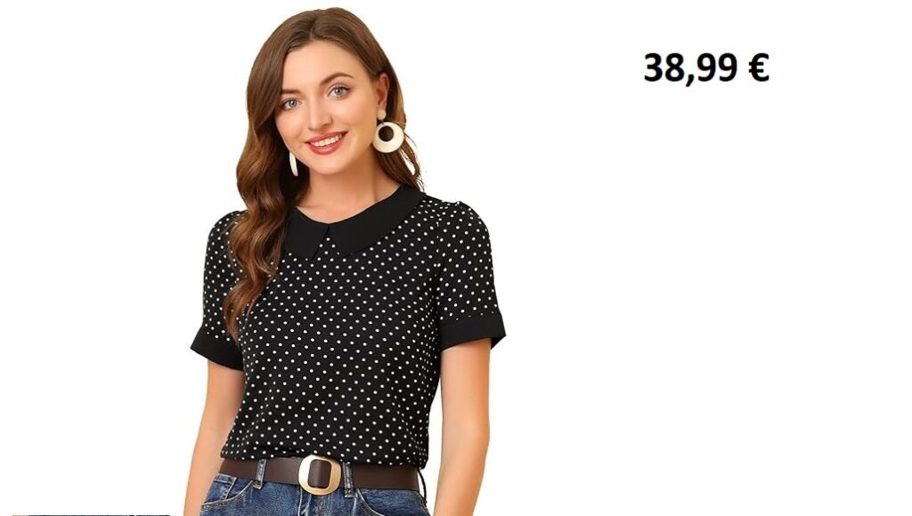 Femme portant un chemisier noir à pois blancs avec col Claudine et manches courtes.