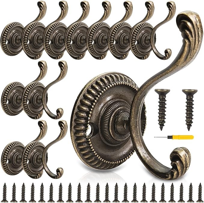 Lot de patères vintage en métal bronze, décorées de motifs classiques, vendu à 18,99 €.