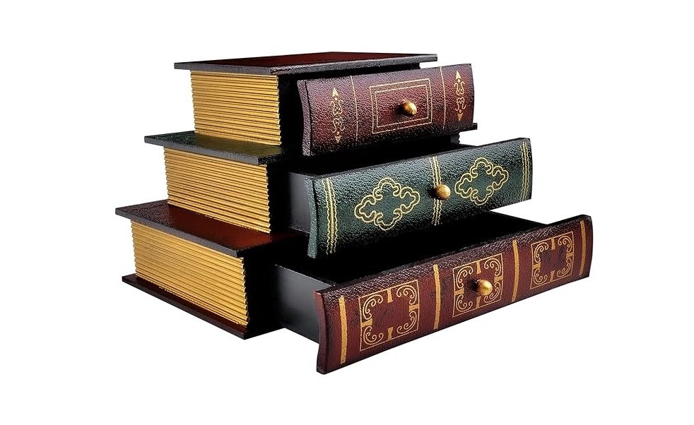 Boîte à tiroirs décorative en forme de pile de livres anciens.