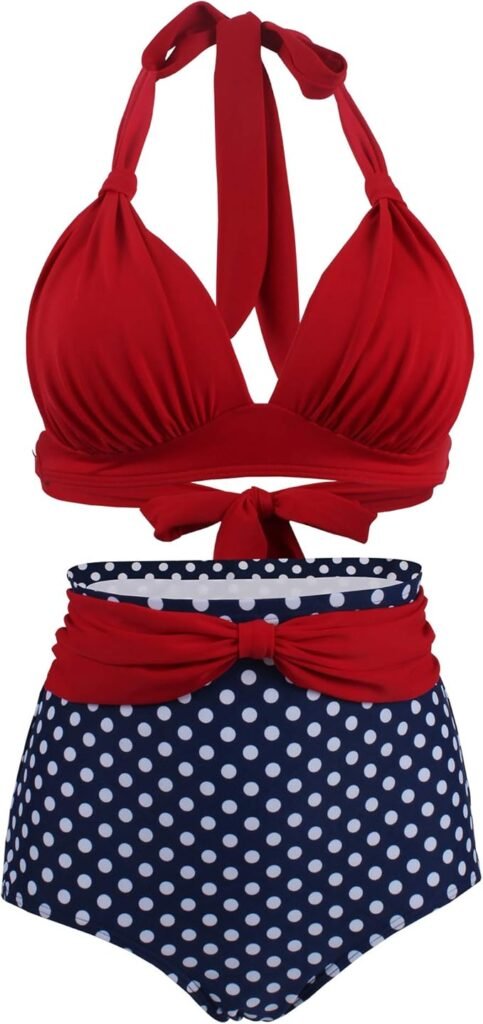 Maillot de bain vintage deux pièces femme, haut rouge noué au cou et culotte taille haute bleu marine à pois blancs.