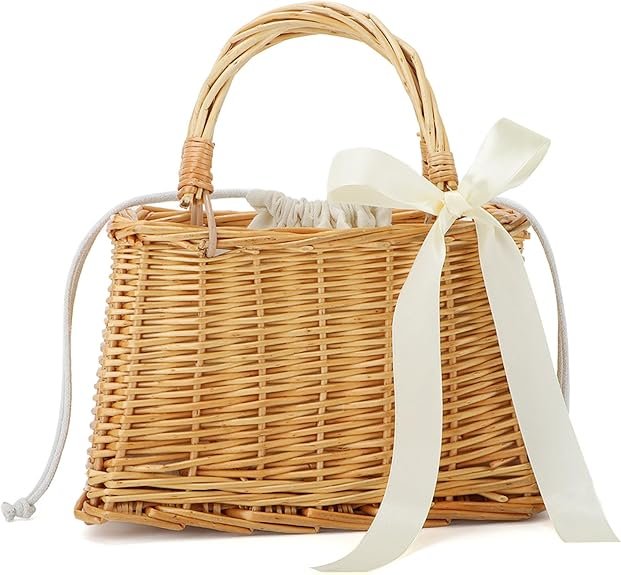 Sac à main en osier avec poignée rigide et nœud blanc élégant, style champêtre et rétro chic.